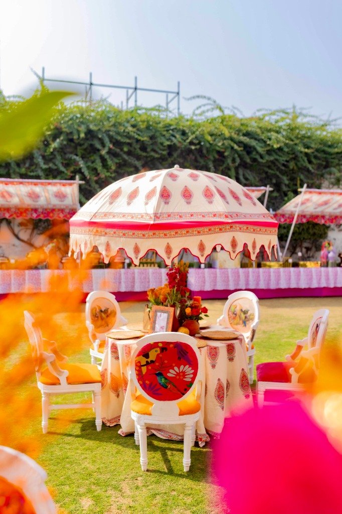 Luxurious outdoor destination wedding with grand floral arch installation